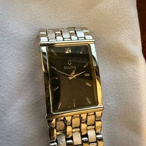 Bulova Silver A7 diamond accent Rectangular Watch.